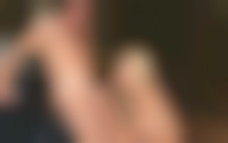 On the hood of a car in the undergrowth